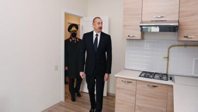 İlham Aliyev, MİDA’nın yaptırdığı binalarda şehit aileleri ve askerlerin kaldığı apartmanlarla tanıştı